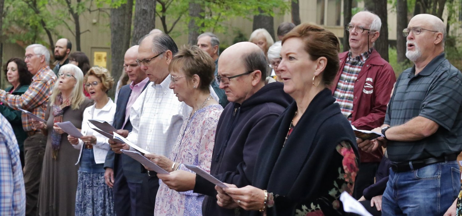 The congregation at the Holly Tree Bible Church sings at Sunday’s Easter sunrise service.
